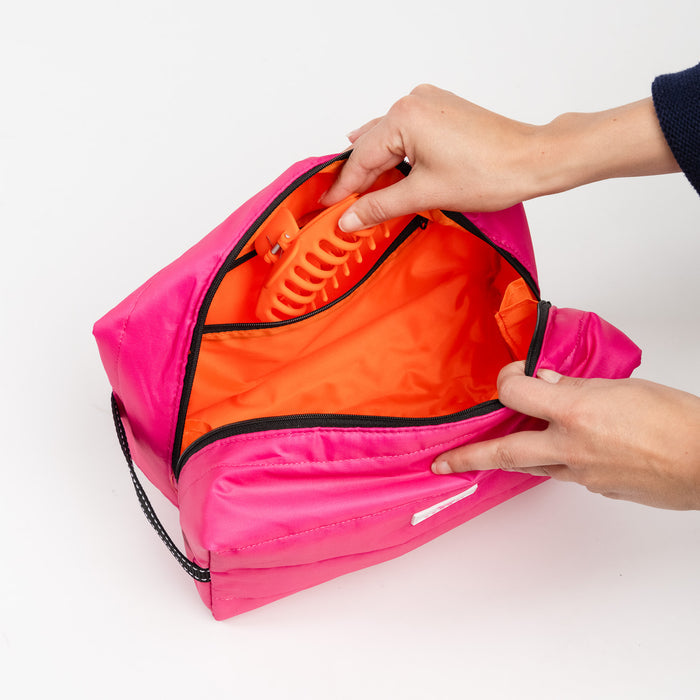 Dopp Till You Drop | Toiletry Bag | Pink Puffer with Orange Interior